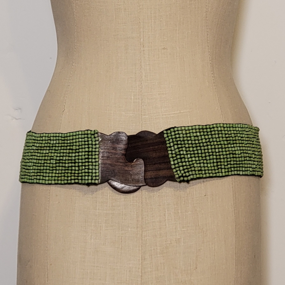 Green bead and wood hand made belt. Stretchy. 30 inches at smallest